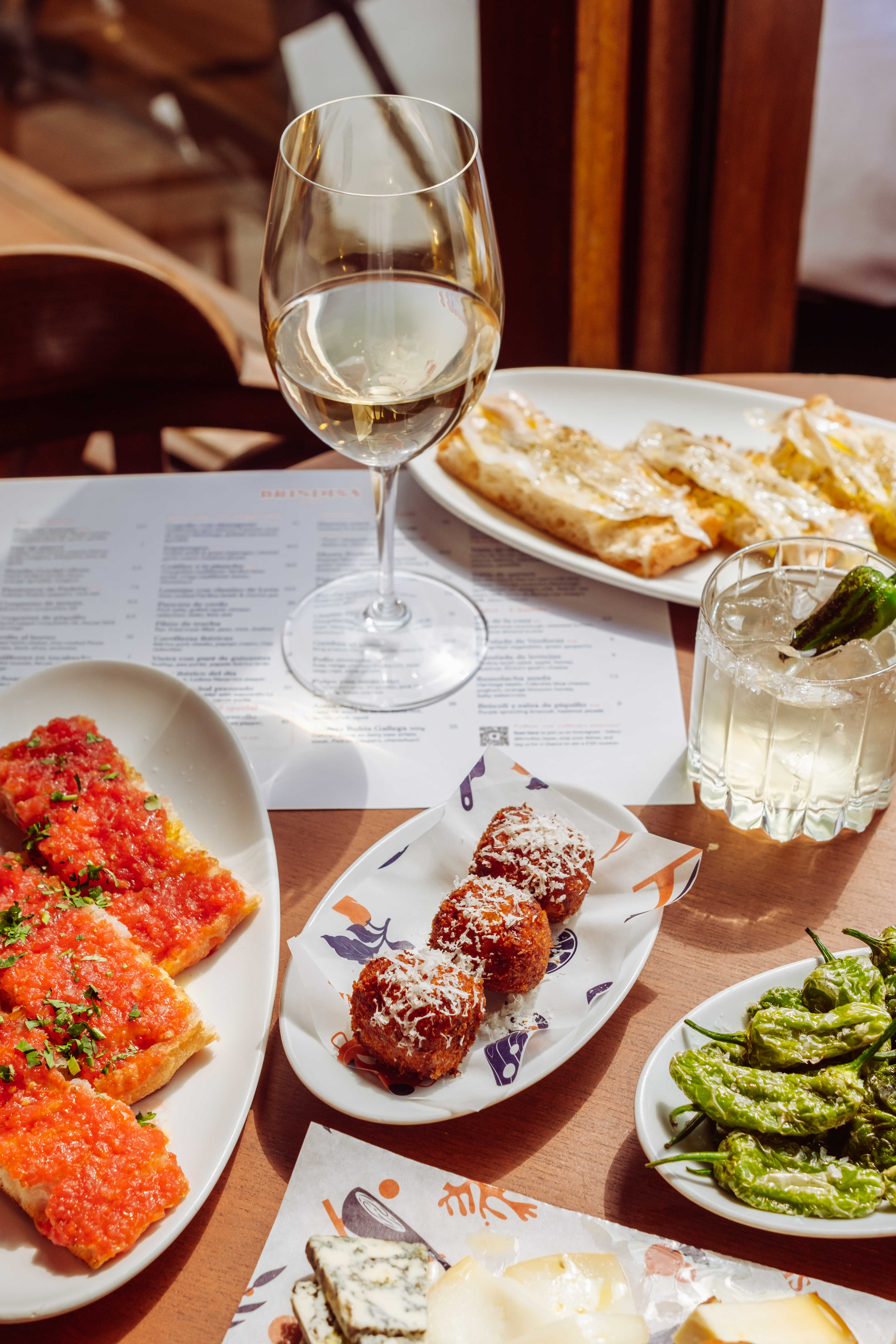 Brindisa Tapas Dishes and white wine